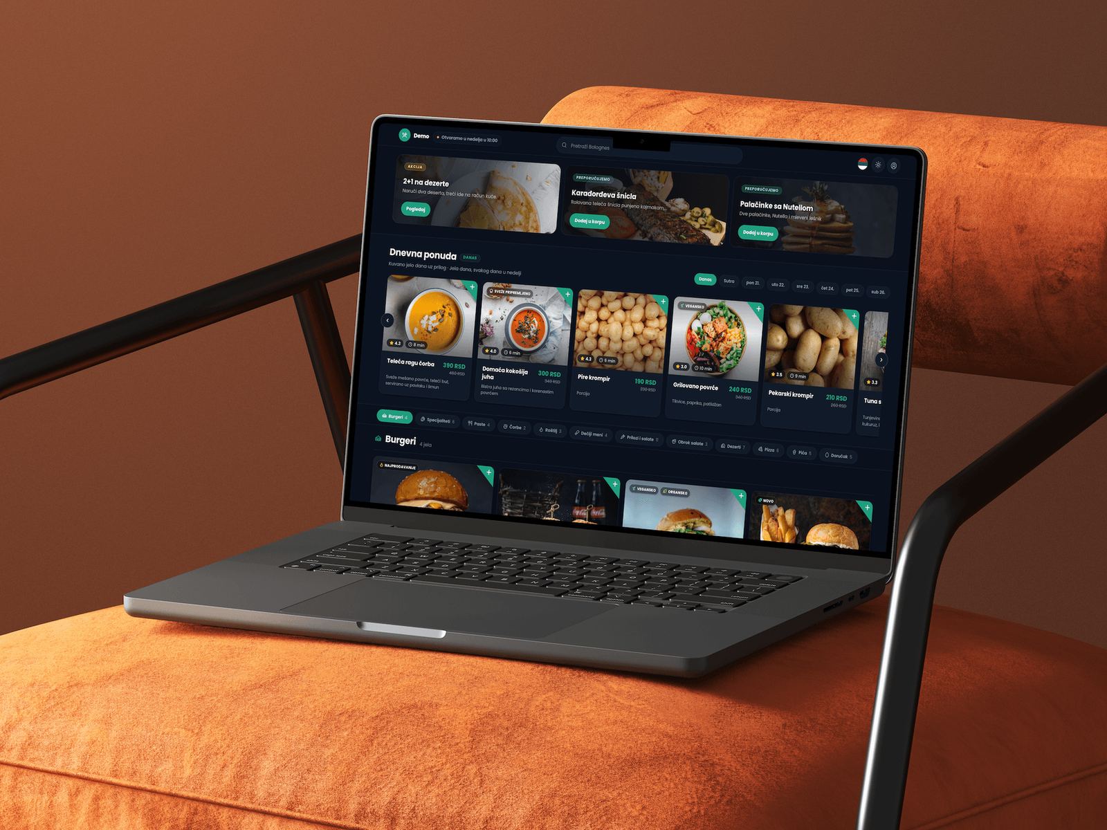 A laptop with the venue’s web shop open — its own page with the menu and prices